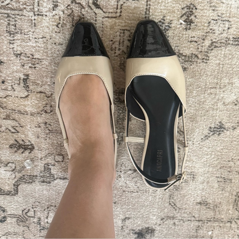 Classic Chic Two-Tone Patent Slingback Flats in Cream and Black